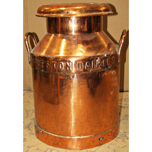 2179 - A vintage copper milk churn with loop handles and lettering Preston Dairies Ltd, number 2000, 50 cm ... 