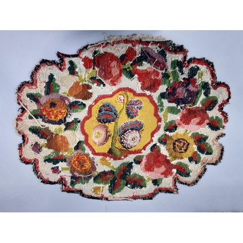 1573 - Three 19th century textile panels of oval shape, all approx 52x40cm, each with finely embroidered ce... 