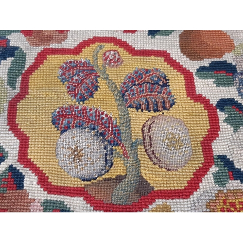 1573 - Three 19th century textile panels of oval shape, all approx 52x40cm, each with finely embroidered ce... 