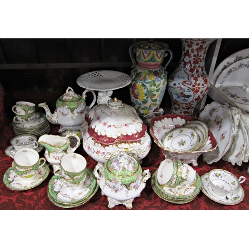 1124 - A collection of 19th century green and gilt teawares including teapot, sucrier, milk jug, eight cups... 