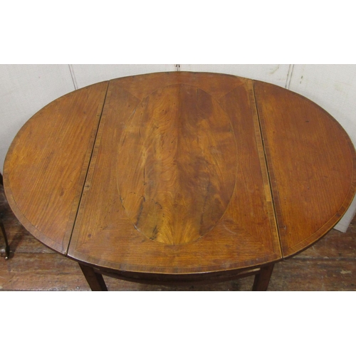 2726 - A Georgian mahogany oval Pembroke table enclosing a single frieze drawer raised on square taper legs... 