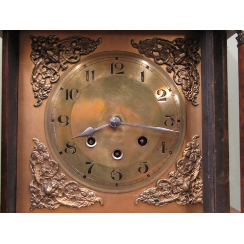 2734 - A walnut longcase clock, the hood enclosing a square brass dial with column supports and eight day t... 