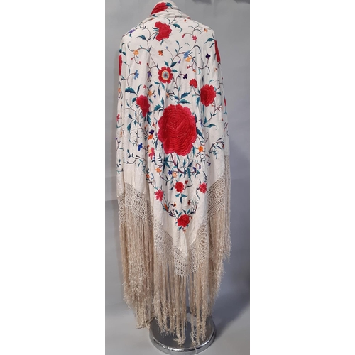 1535 - Silk piano shawl embroidered with chrysanthemums on ivory ground, surrounded by deep fringe. Size in... 