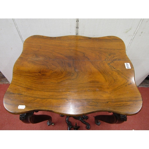 2737 - 19th century rosewood centre/occasional table, each side with serpentine outline, raised on four sha... 