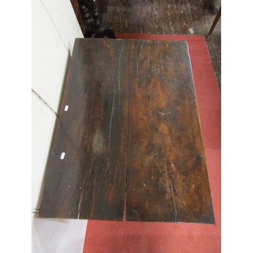 2741 - An 18th century walnut side table enclosing a single shallow frieze drawer raised on four turned sup... 