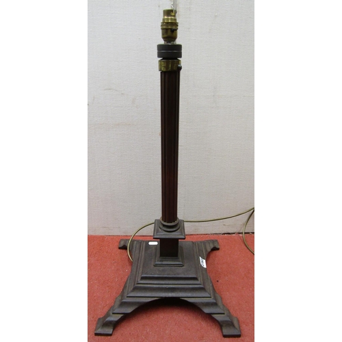 2763 - An ironwork lamp standard with reeded column on square cut platform base, 65 cm height