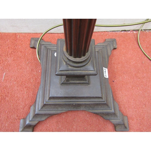 2763 - An ironwork lamp standard with reeded column on square cut platform base, 65 cm height