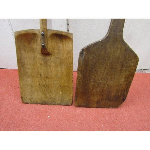 2764 - A baker peel and an elm and fruitwood malt shovel