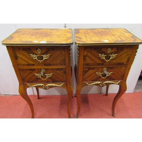 2769 - A pair of French bedside/lamp tables the rectangular top with parquetry detail fitted with two friez... 