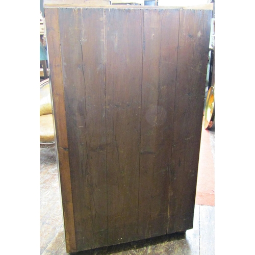 2778 - An 18th century oak side cupboard enclosed by two fielded panelled doors, the interior fitted for vi... 