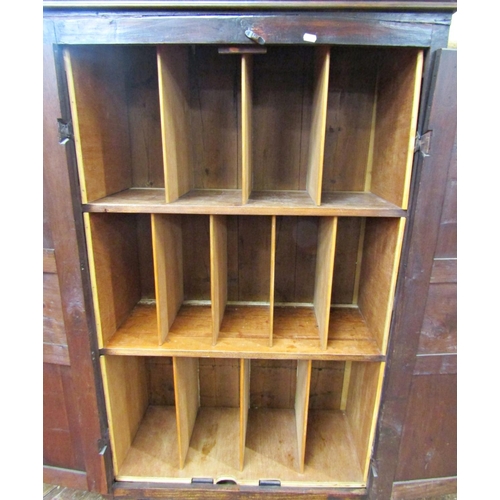 2778 - An 18th century oak side cupboard enclosed by two fielded panelled doors, the interior fitted for vi... 