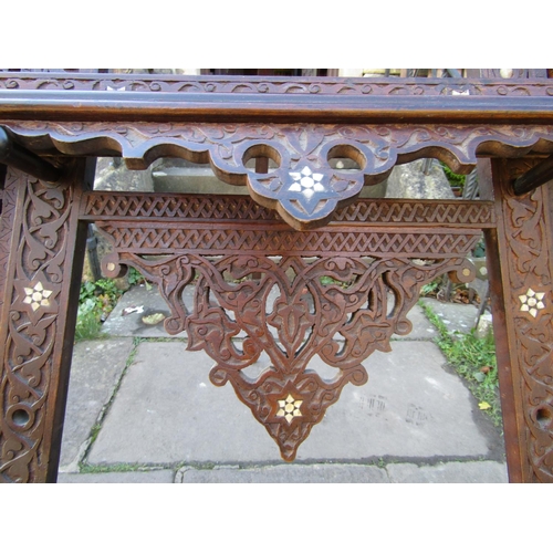 2781 - A late 19th century Moorish easel with repeating geometric detail and further mother-of-pearl inlaid... 