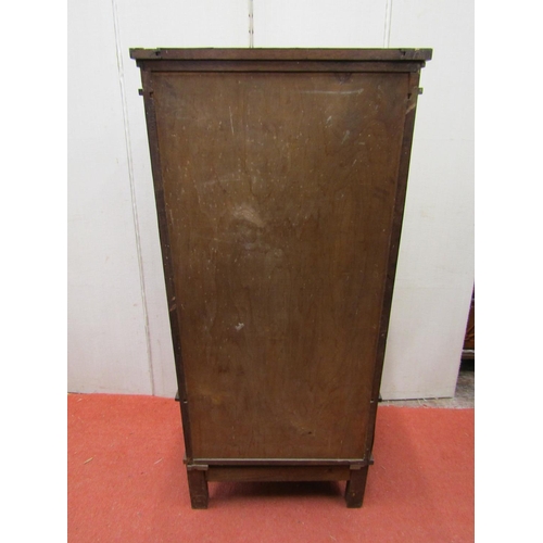 2785 - A small rosewood cabinet in an Art Deco design, the front elevation enclosed by a pair of panelled d... 