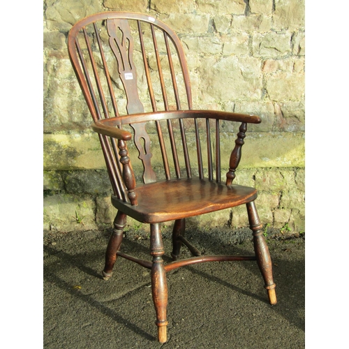 2794 - A 19th century windsor mixed wood hoop and stick back elbow chair with pierced splat turned supports... 