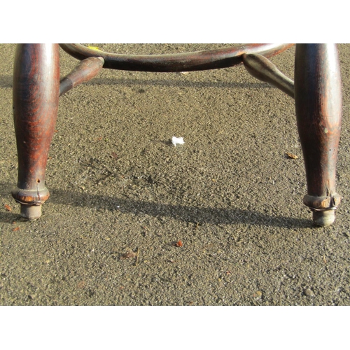 2794 - A 19th century windsor mixed wood hoop and stick back elbow chair with pierced splat turned supports... 