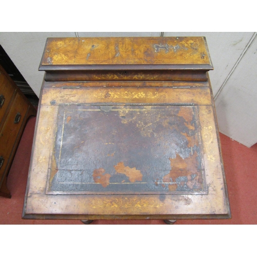 1518 - A Victorian walnut and figured walnut Davenport of usual form, enclosing four real and four dummy dr... 
