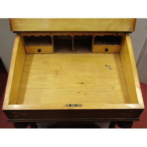 1518 - A Victorian walnut and figured walnut Davenport of usual form, enclosing four real and four dummy dr... 