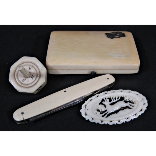 445 - 19th century bone spinning dice, Tyrolean antler brooch, ivory cigarette case, together with a pen k... 