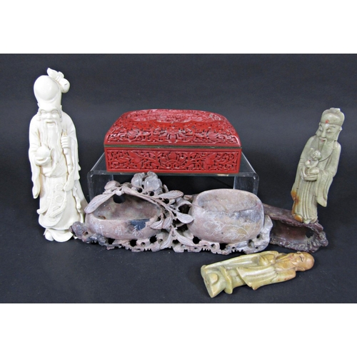 452 - An ivory figure of a Chinese Immortal, further example in soapstone, red lacquered and enamel lined ... 