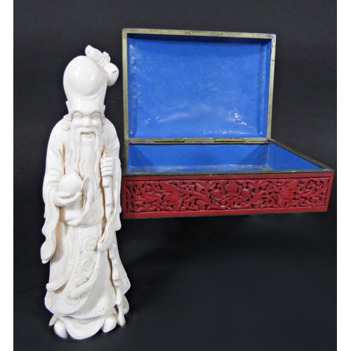 452 - An ivory figure of a Chinese Immortal, further example in soapstone, red lacquered and enamel lined ... 