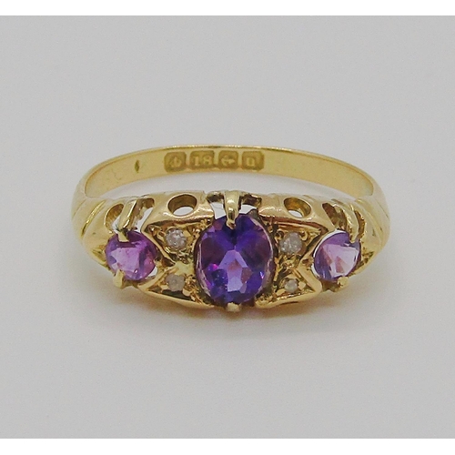 345 - Early 20th century 18ct amethyst and diamond ring, size K, 2.1g