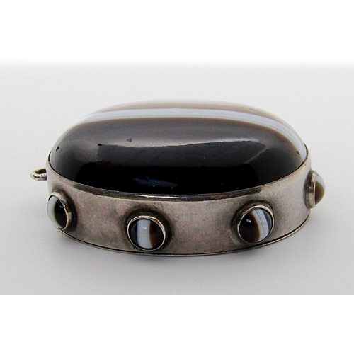 362 - Victorian Scottish banded agate mourning pendant, the large central cabochon agate within a surround... 