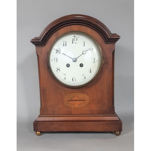 404 - An inlaid Edwardian mahogany mantel clock with string inlay and other detail, with enamelled convex ... 