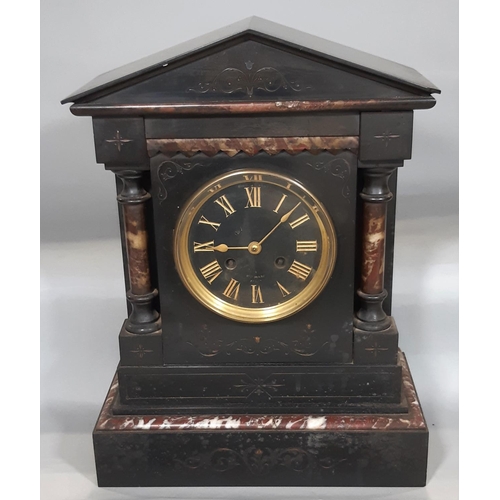 407 - A mid-Victorian period black slate and polish marble mantel clock of architectural form, enclosing a... 