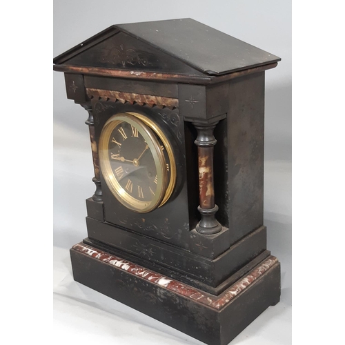 407 - A mid-Victorian period black slate and polish marble mantel clock of architectural form, enclosing a... 