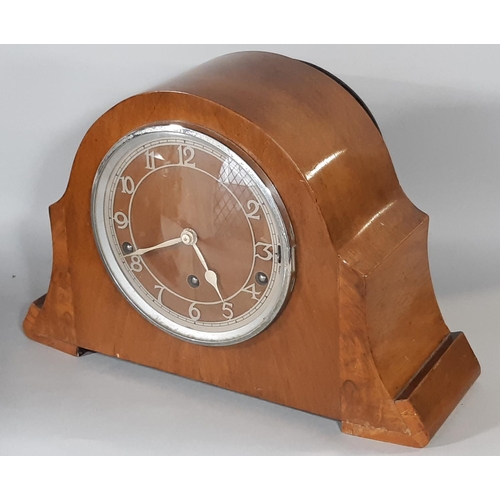 411 - An art deco walnut and figured walnut mantel clock with three train movement, Westminster chime, pen... 