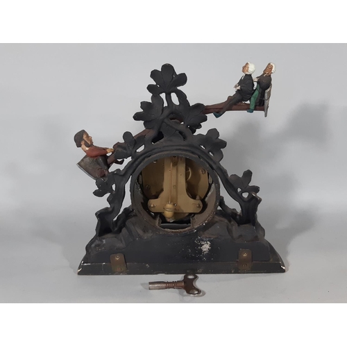 412 - An American mantel clock in carved spelter, the clock face simulating a timber log, with applied Rom... 