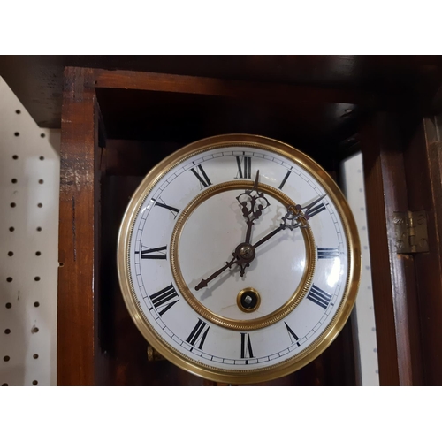 414 - A small 19th century Vienna style regulator wall clock in walnut and with applied ebonised mounts, w... 