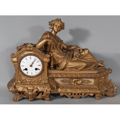 418 - A 19th century gilded spelter mantel clock in the romantic style with eight day striking movement, t... 