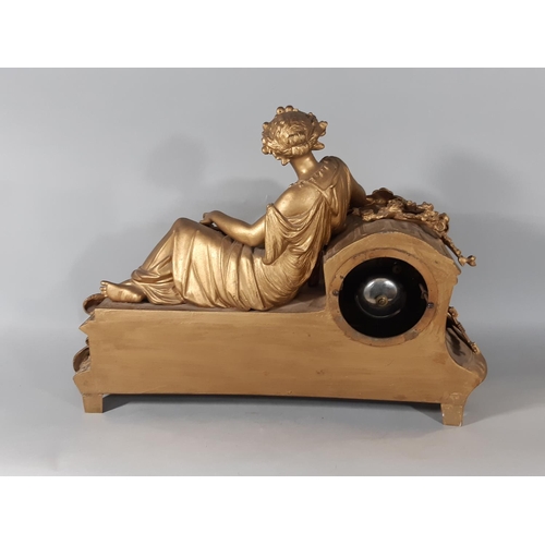 418 - A 19th century gilded spelter mantel clock in the romantic style with eight day striking movement, t... 