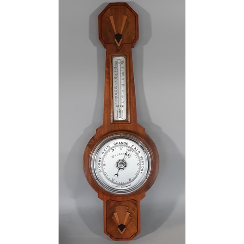 420 - An art deco aneroid barometer in walnut and figured walnut, with decorative applied detail and ename... 