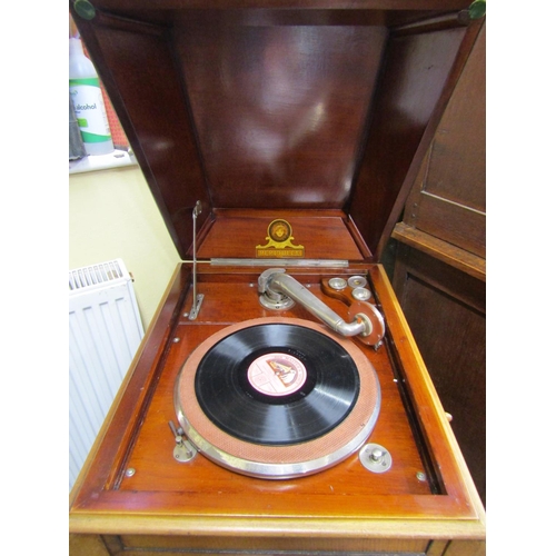 1502 - A Peridulce Beltona floorstanding gramophone with chrome fittings, the front elevation enclosed by t... 