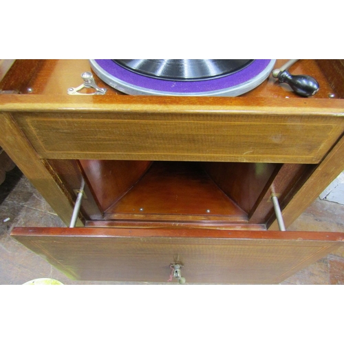 1503 - A vintage floorstanding gramophone The Algraphone, with chrome fittings, the front elevation enclose... 
