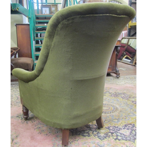 1510 - A mid 19th century library chair with partial show wood frame on turned supports,