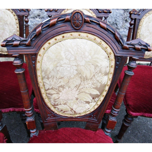 1520 - A set of six Victorian walnut dining chairs with turned supports and shaped backs with upholstered s... 