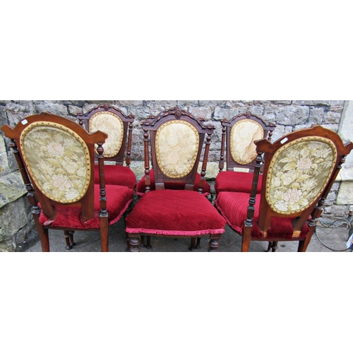 1520 - A set of six Victorian walnut dining chairs with turned supports and shaped backs with upholstered s... 