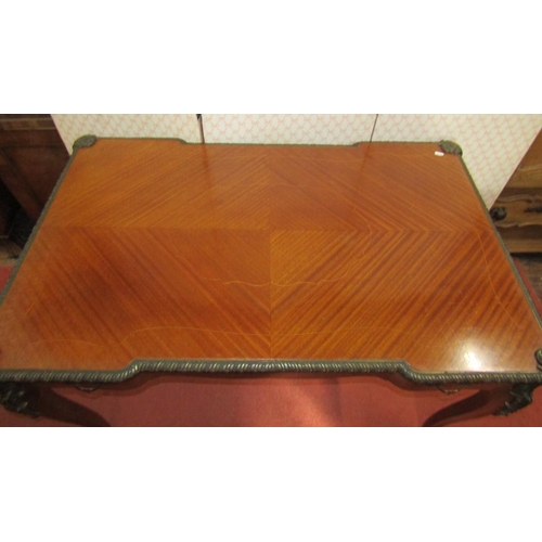 1523 - A good quality reproduction French writing desk with quarter panelled top over a single frieze drawe... 