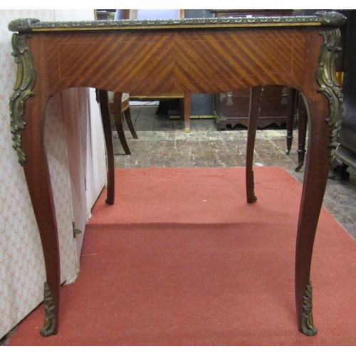 1523 - A good quality reproduction French writing desk with quarter panelled top over a single frieze drawe... 