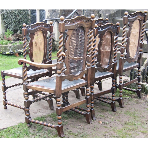 1527 - A set of six (2+4) Carolean style dining chairs with cane panelled backs and upholstered seats, with... 