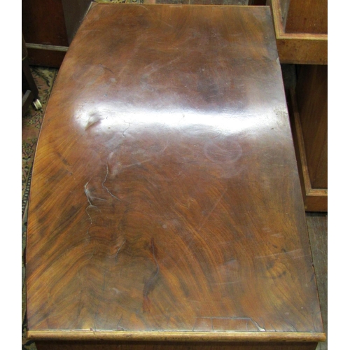 1542 - A mid-Victorian mahogany bow front chest of two long and two short drawers on swept supports, 90cm w... 