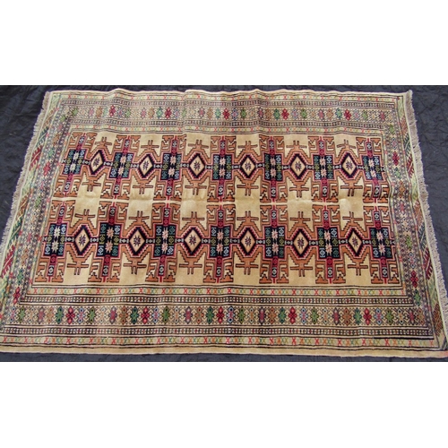 1477 - A Turkoman rug with repeating geometric design on a pale cream ground, 190 x 135cm