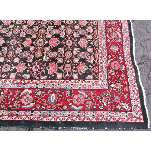 1486 - A large Persian design carpet with overall stylised floral pattern on a blue ground, 325 x 250cm