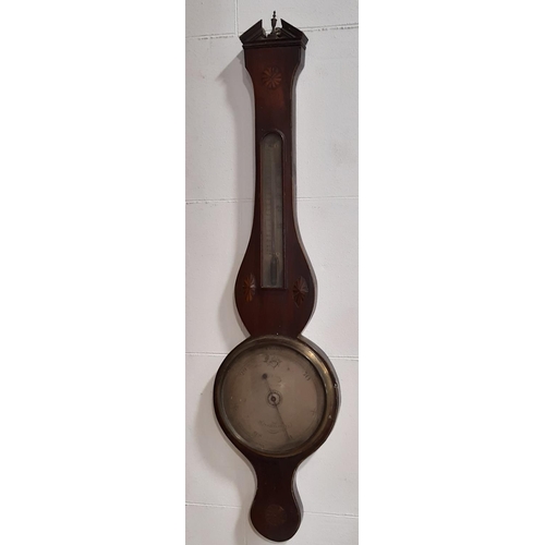 421A - A Georgian mahogany wheel barometer with inlaid casework and silvered dials F. Vago, London