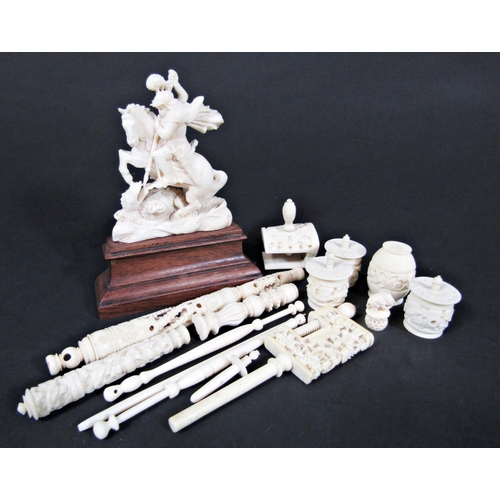 460 - A collection of Victorian and later carved ivory sewing effects including clamps, needle cases, bobb... 