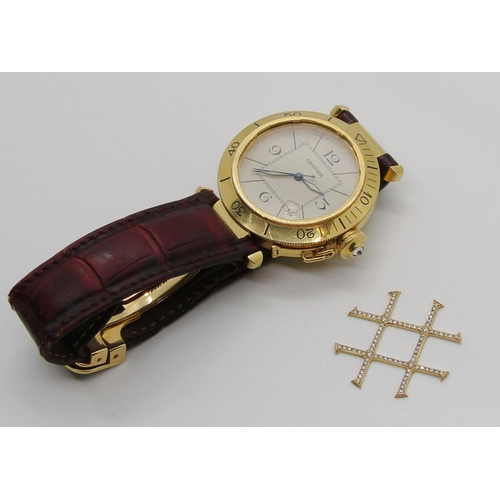 399 - An 18ct yellow gold Pasha de Cartier gentleman's automatic wristwatch, diamond set grid (which can b... 