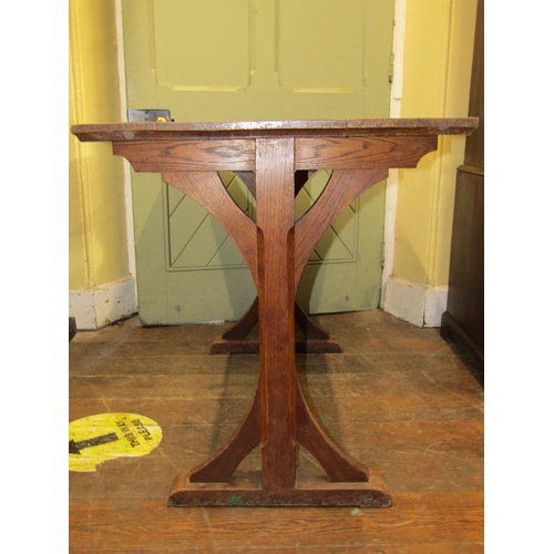1536 - A Victorian centre or library table in the Gothic manner, rectangular, raised on stretcher base with... 